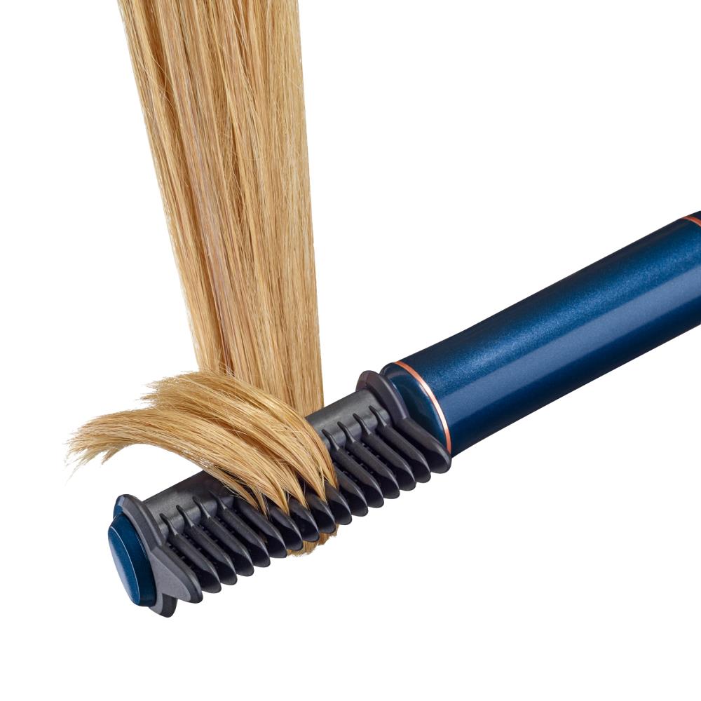 The Cordless Frizz Eliminating Straightening Comb